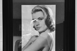 A reflection of myself in a photo of Grace Kelly.